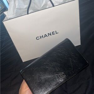 CHANEL Lambskin Camellia Embossed Yen Wallet